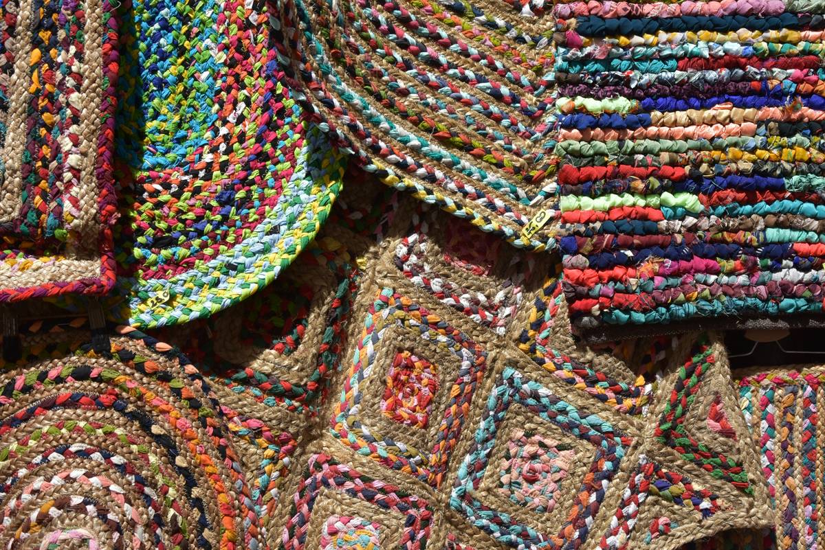 how to make biodegradable clothes using cotton and cellulose fibers on a wooden table with scissors and thread